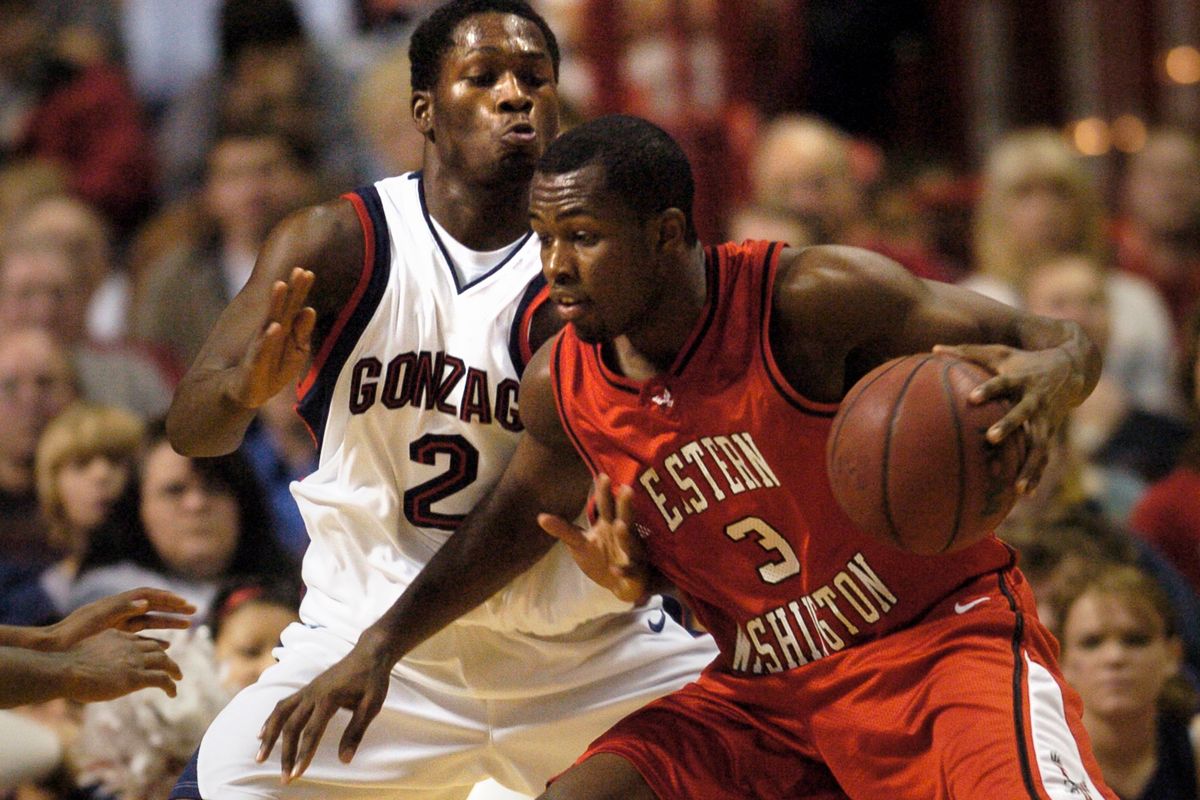 Above: Eastern Washington’s Rodney Stuckey drives on Jeremy Pargo of Gonzaga during their basketball game at the Spokane Arena on Dec. 19, 2005. Left: Guard Rodney Stuckey (2) runs into Golden State guard Klay Thompson while driving to the basket in the second half of Indiana’s Feb. 22, 2015 game against the Warriors in Indianapolis.  (Associated Press)