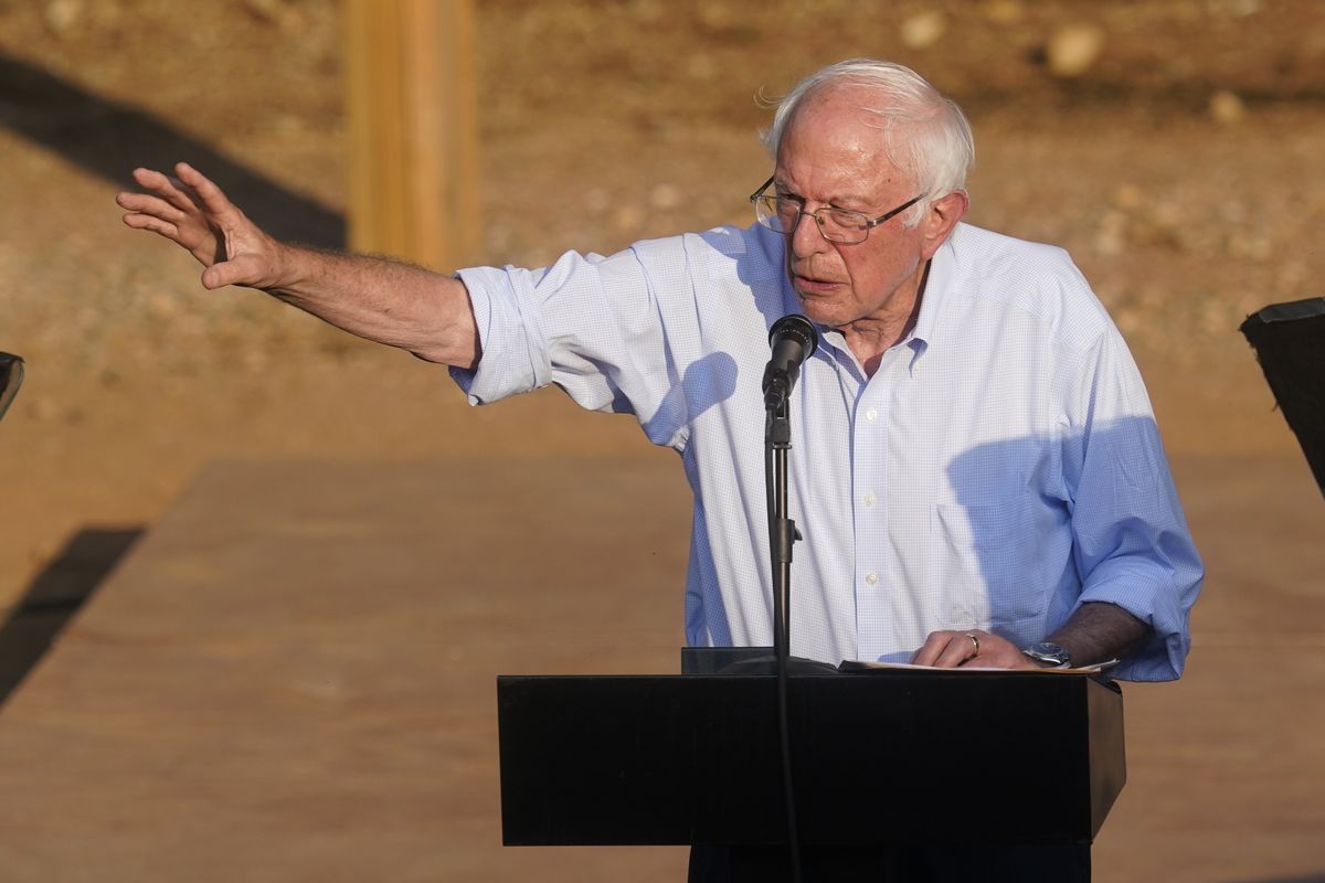 Sen. Bernie Sanders, I-Vt., speaks during town hall at Tippecanoe County Amphitheater, Friday, Aug. 27, 2021, in West Lafayette, Ind. “My Republican colleagues are telling everybody that Bernie Sanders and the Democrats are going to raise taxes. You’re right, we’re gonna raise them on the richest people in this country,” Sanders said to the cheers of about 1,500 who braved sweltering heat and humidity at the outdoor amphitheater.  (Darron Cummings)