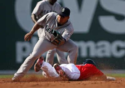 
Boston's Coco Crisp steals second base during the third inning Saturday as Seattle's Jose Lopez awaits the throw. Associated Press
 (Associated Press / The Spokesman-Review)