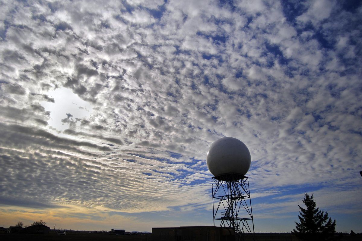 Cloudy skies frame the Doppler radar at the National Weather Service in Spokane, Wash., in 2009. The National Weather Service station is replacing the pedestal for its radar that was set up in the 90s. (The Spokesman-Review photo archive / Spokesman-Review archive)