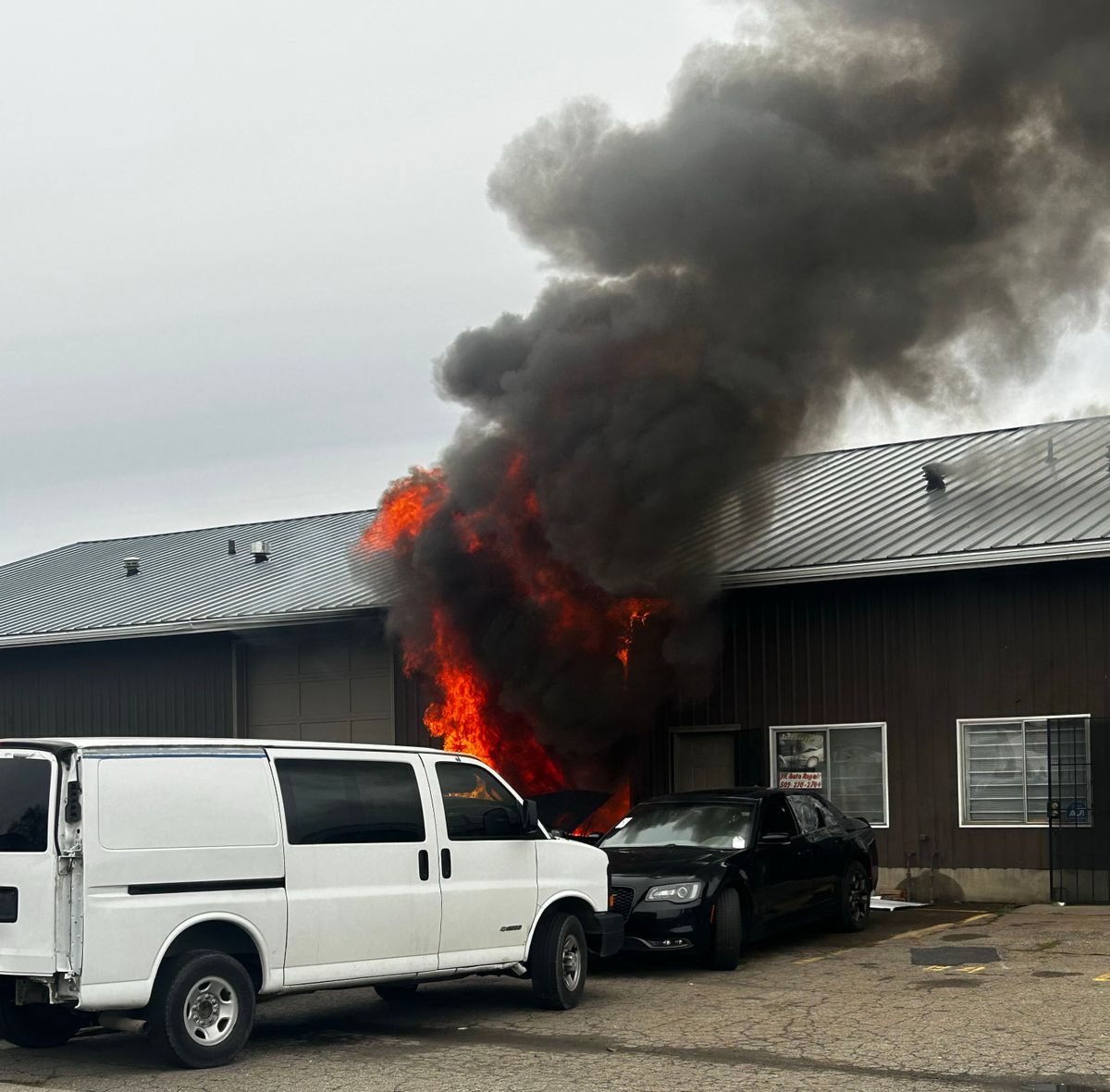 This photo shows the blaze that started at about 11:26 a.m. Tuesday at a unit inside 1811 E. Holyoke Ave. in Spokane. The fire totally destroyed one unit and damaged another. (Photo courtesy of Thomas "T.J." Wheat)