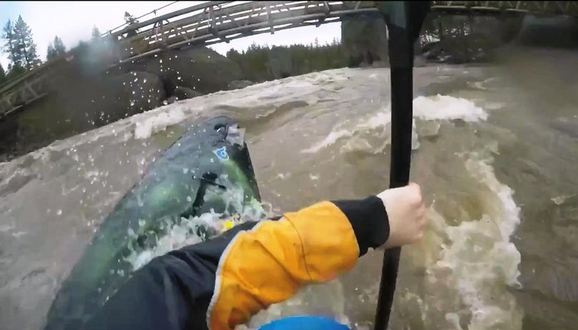 Kayaking the Spokane River Bowl and Pitcher area in runoff flows. (Brian Jamieson)