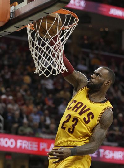 Cleveland Cavaliers' LeBron James dunks against the Milwaukee Bucks in the first half of an NBA basketball game, Monday, Feb. 27, 2017, in Cleveland. The Cavaliers won 102-95. (AP Photo/Tony Dejak) ORG XMIT: OHTD117 (Tony Dejak / AP)