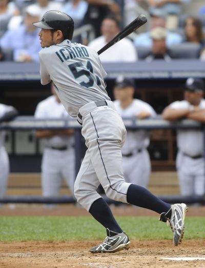 Mariners' Ichiro Suzuki hits his second home run of the game, a solo shot in the third. (Associated Press)