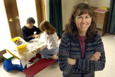 
Jill Nardini, right, at her classroom in her Kentwood, Mich. home where she teaches her two children, Joey, 9, far left, and Jessie, 7. Nardini planned to homeschool her family even before she had children. Nardini said as an older mom she wanted to spend as much time as possible with her children. 
 (Associated Press / The Spokesman-Review)