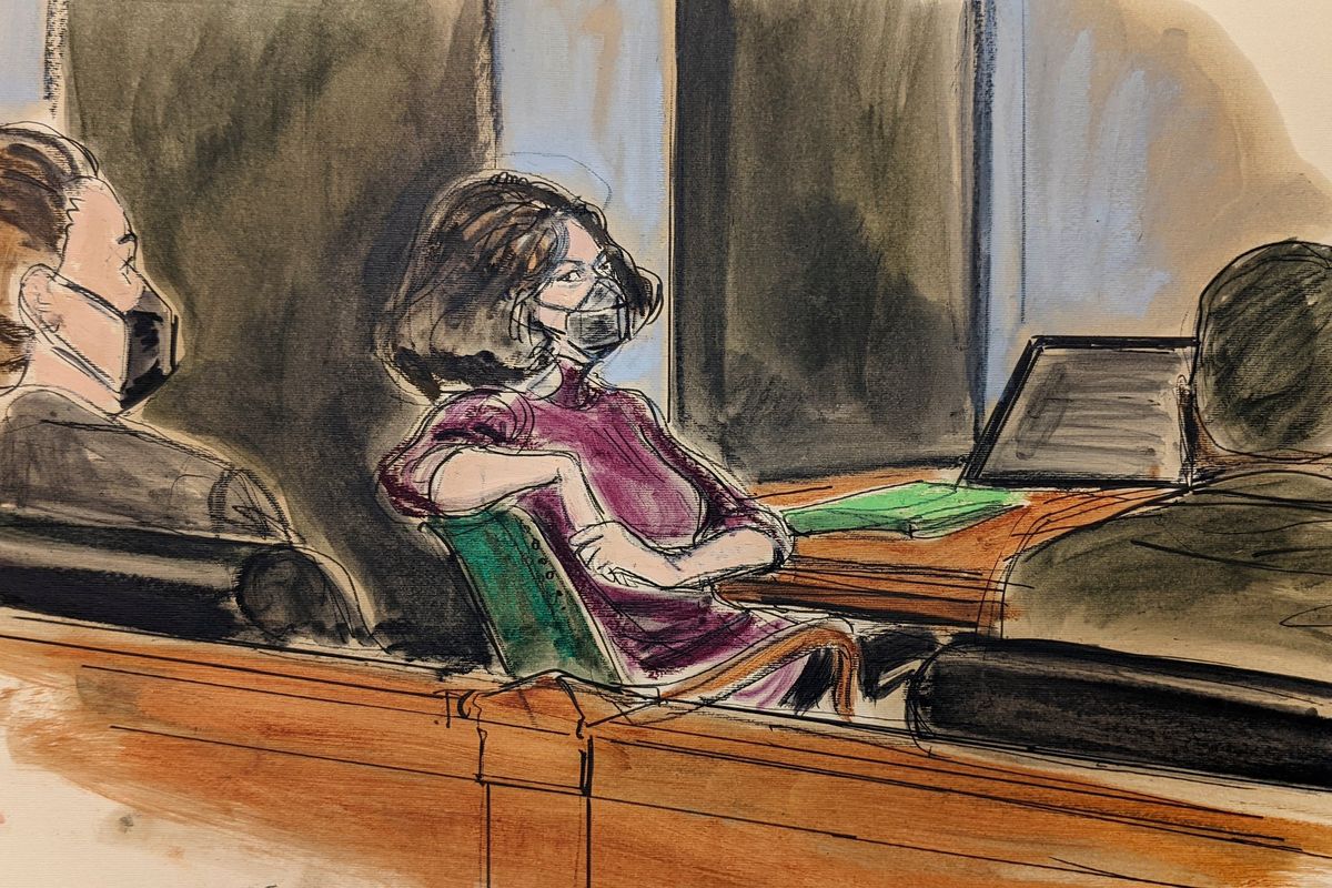 In this courtroom sketch, Ghislaine Maxwell, center, sits in the courtroom during a discussion about a note from the jury, during her sex trafficking trial, Wednesday, Dec. 29, 2021, in New York.  (Elizabeth Williams)