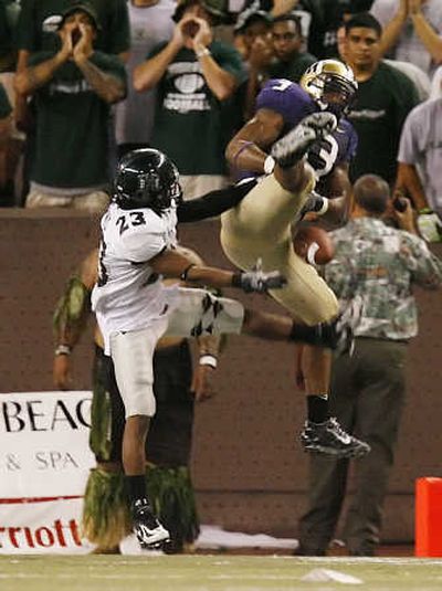 
Marcel Reece was unable to hold on to this pass in the final seconds, resulting in an interception. Associated Press
 (Associated Press / The Spokesman-Review)