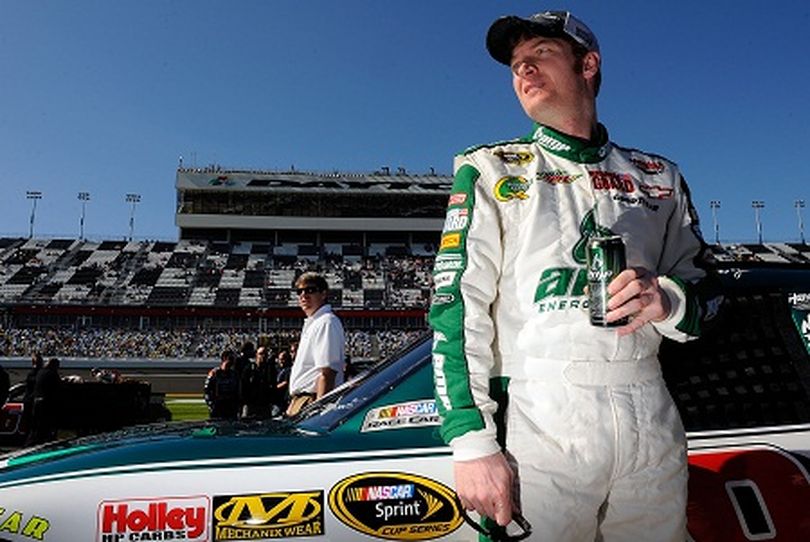 Dale Earnhardt Jr looks on as he sits on the provisional pole with a top speed of 186.089mph during qualifying at Daytona International Speedway in Daytona Beach, Fla. (Photo Credit: Jared C. Tilton/Getty Images for NASCAR) (Jared Tilton / Getty Images North America)