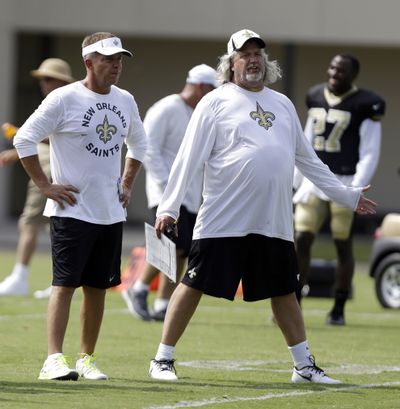 Saints head coach Sean Payton, left, didn’t let Rob Ryan stay unemployed for long. (Associated Press)