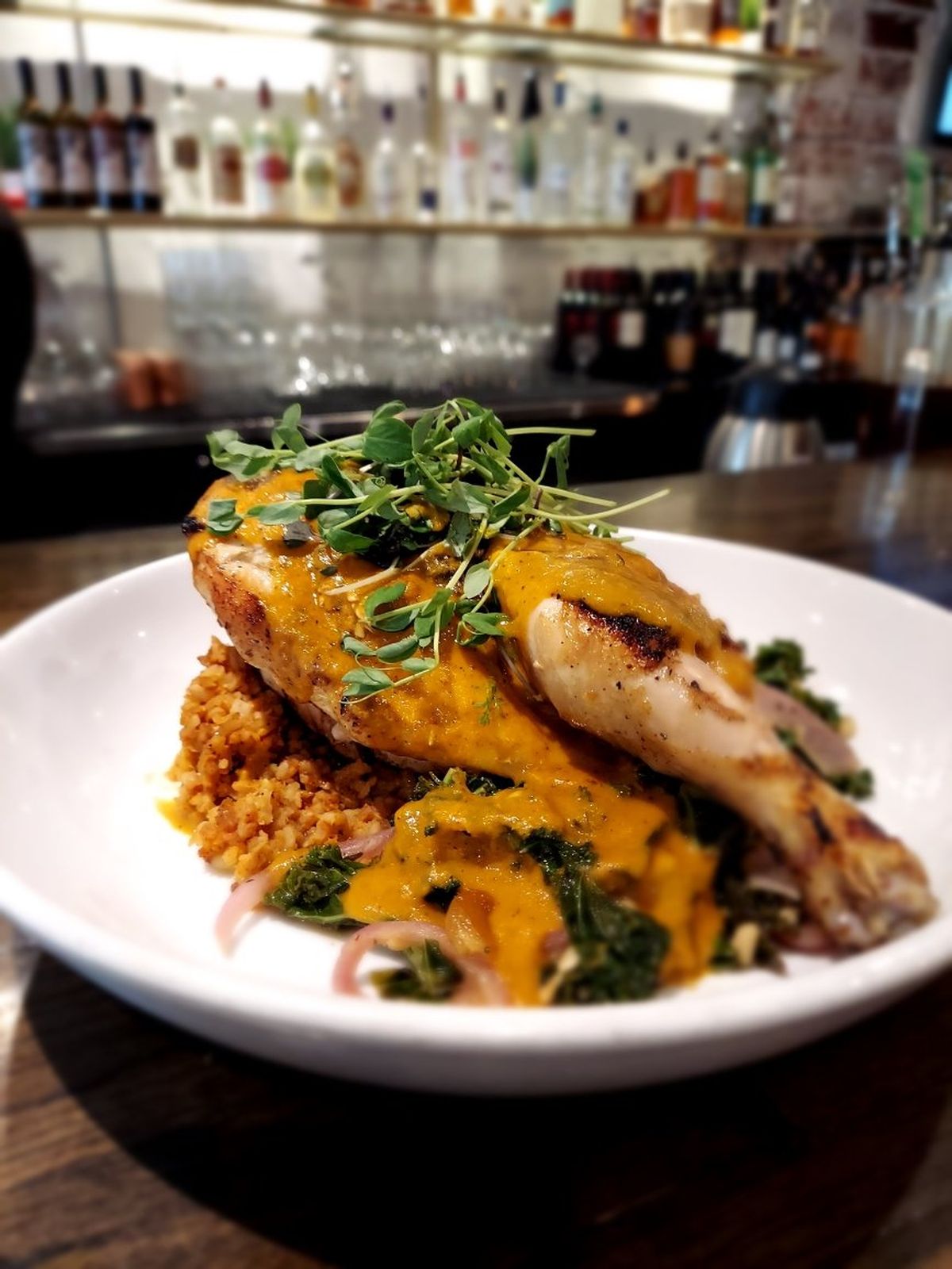 One of the new menu items Jordan Obermeyer has planned for Remedy is brick chicken with salsa espanola, Catalan braised kale, pine nuts and Spanish rice.  (Courtesy of Jordan Obermeyer)