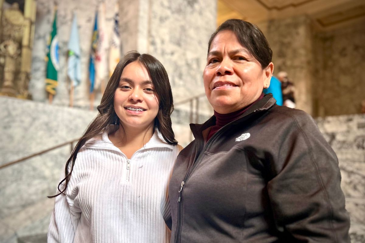 Elisa Garcia, right, and her daughter, Jasmin Alcantar, stand in the rotunda of the Washington State Legislative Building on Tuesday in Olympia.  (Ellen Dennis / The Spokesman-Review)
