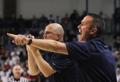 San Diego coaches Bill Grier, right, and Mike Burns returned to familiar surroundings on Saturday.  (Dan Pelle / The Spokesman-Review)