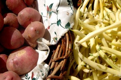 
Fresh vegetables sit in the morning sun at the Spokane Farmers' Market. 
 (Joe Barrentine / The Spokesman-Review)