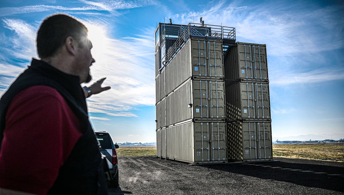 Coeur d’Alene Airport Director Gaston Patterson talks Friday about the makeshift air traffic control tower made from stacked shipping containers at the airport.  (Kathy Plonka/The Spokesman-Review)