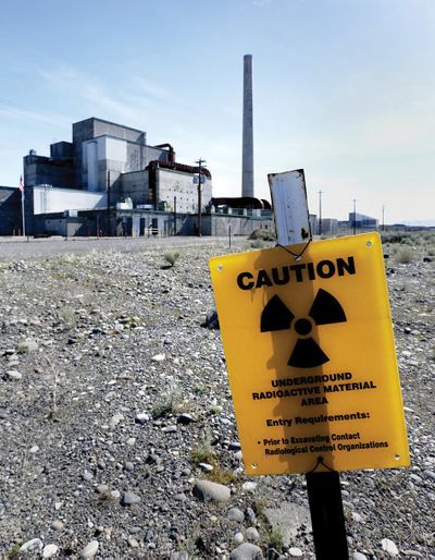 Signs warn visitors approaching the B Reactor on the Hanford Nuclear Reservation in south-central Washington in 2016.  (Tribune News Service)