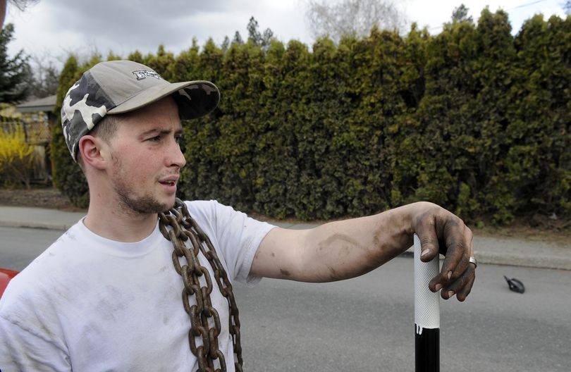 Joseph Maine, then 22, witnessed the one-car accident at 32nd and Ray, April 1, 2010, and raced to the scene with a car jack to assist the father and three children trapped in the car. (Dan Pelle / The Spokesman-Review)