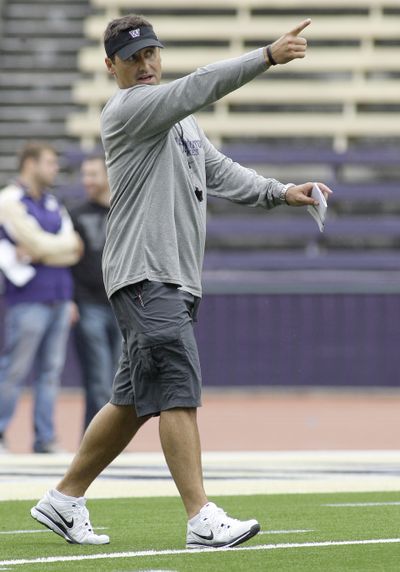 UW fans have  warmed to Steve Sarkisian.  (Associated Press / The Spokesman-Review)