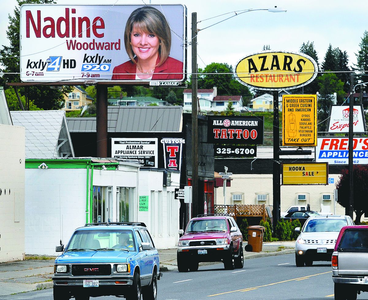 KXLY has mounted a billboard blitz as part of a campaign to promote morning newscaster Nadine Woodward. Passers-by on the 2400 block of North Monroe are reminded of the times to watch her on TV and listen to her on radio.  (Dan Pelle)