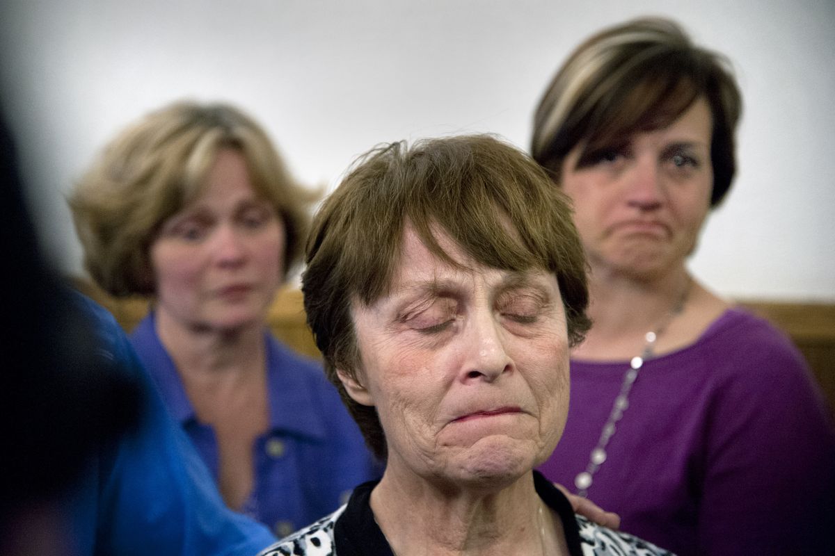 Ann Kaluza pauses to remember her grandson Brendon Kaluza-Graham in the hallway of the Spokane County Courthouse, April 10, 2014,  after a jury acquitted Gail Gerlach of manslaughter in the shooting death of Kaluza-Graham in March 2013. (Dan Pelle / The Spokesman-Review)