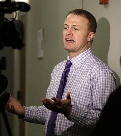 In this Jan. 21, 2016 file photo, Tim Eyman speaks with reporters after hearing that a judge struck down his latest tax-limiting measure in Olympia, Wash. (Elaine Thompson / AP)