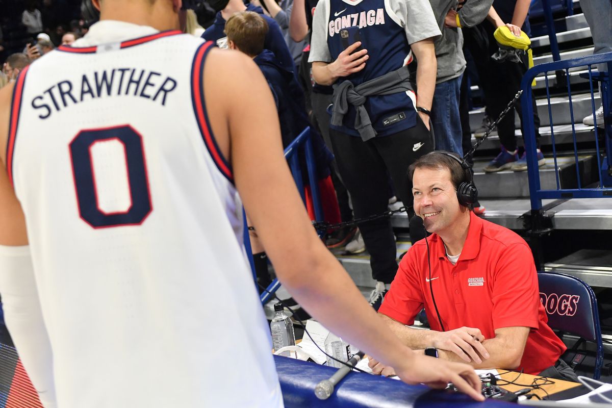 Tom Hudson interviews Gonzaga guard Julian Strawther after a February college basketball game at McCarthey Athletic Center in Spokane.  (Tyler Tjomsland / The Spokesman-Review)