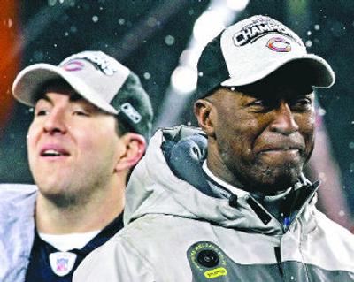 
Chicago quarterback Rex Grossman, left, and head coach Lovie Smith enjoy their victory over New Orleans in NFC title game.
 (Associated Press / The Spokesman-Review)