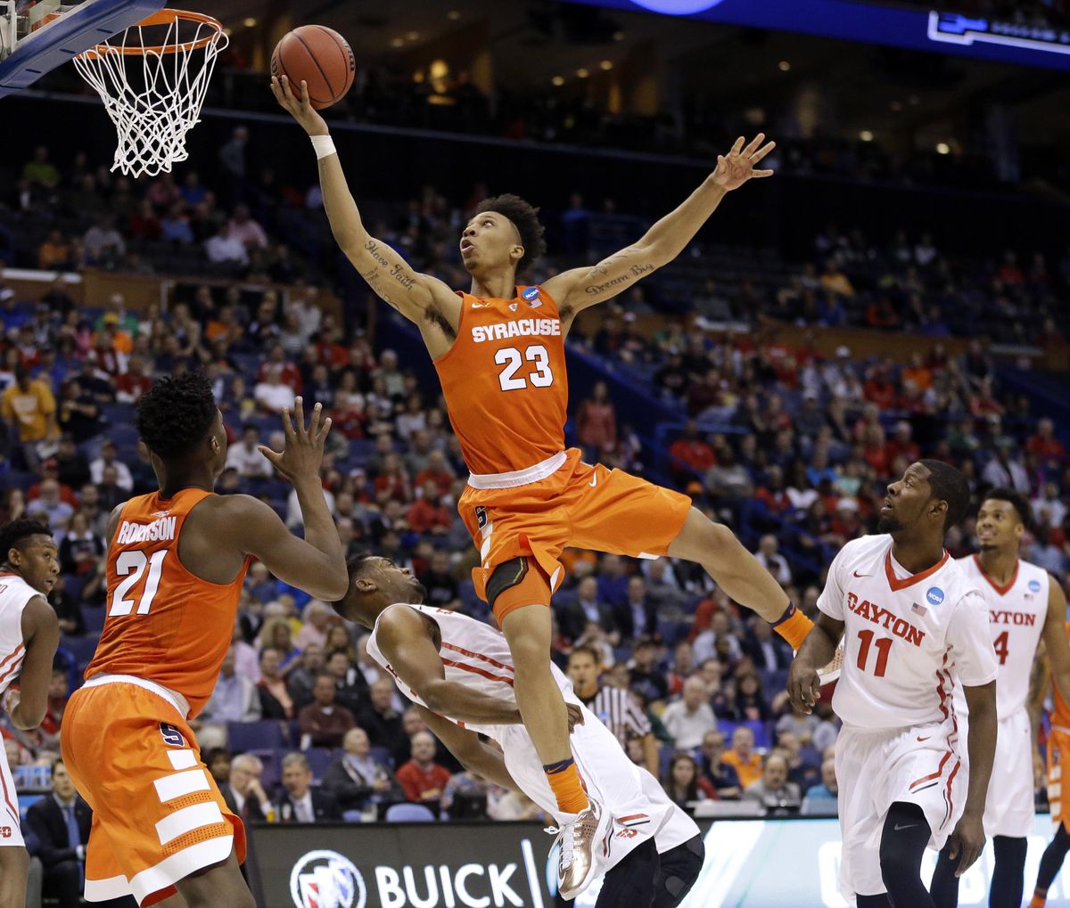 Malachi Richardson (23) and his 10th-seeded Syracuse Orange have soared into contention with a Sweet 16 matchup against the 11th-seeded Gonzaga Bulldogs. (Jeff Roberson / Associated Press)