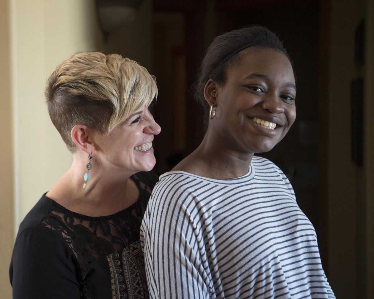 Lucinda Kay and her adopted daughter Tressanna Martin Adams, 18, pose for a photo Monday, Feb. 26, 2018. Tressanna, from Jamaica, is still working on her permanent status in the United States. (Jesse Tinsley / The Spokesman-Review)