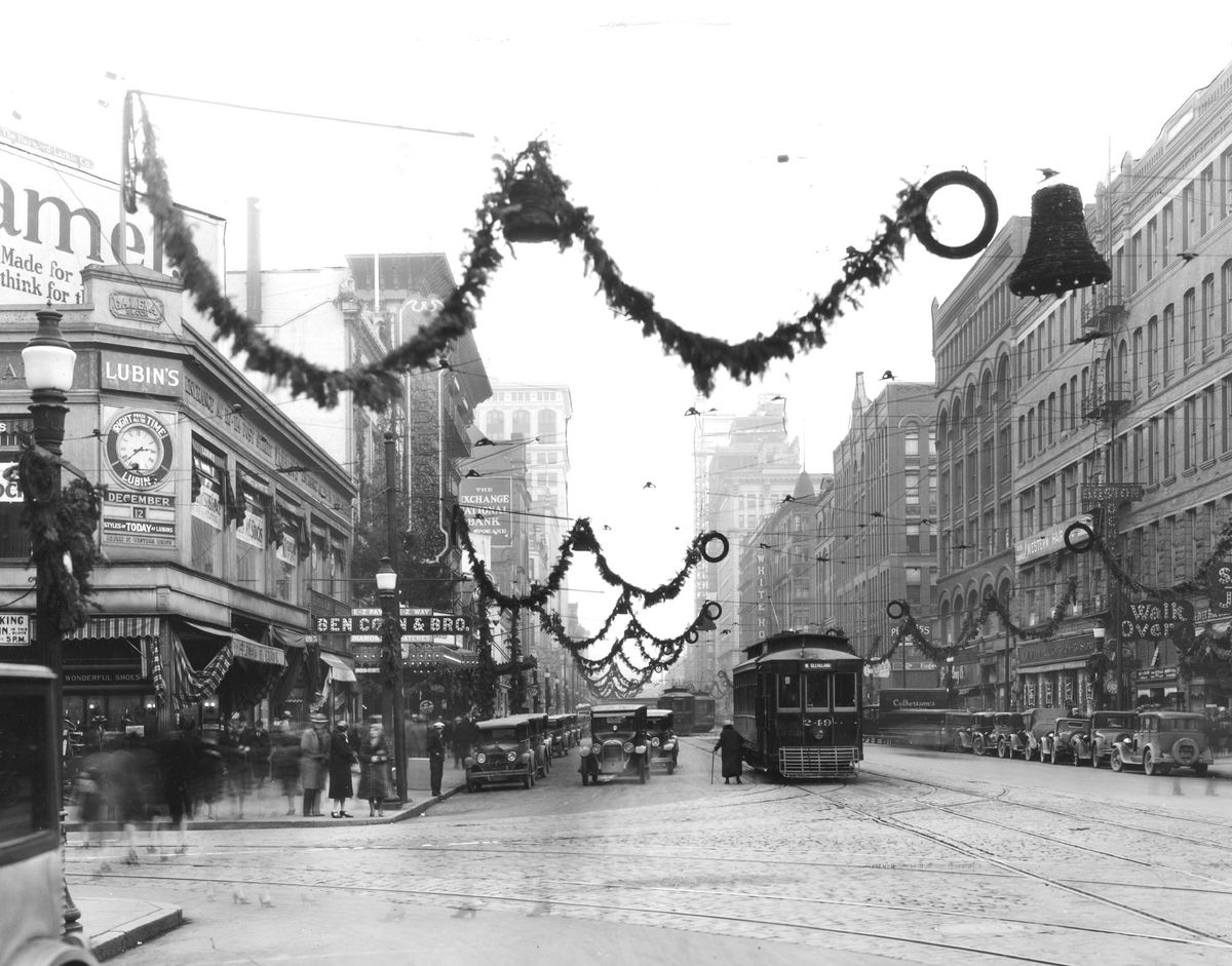 Dec. 12, 1928: In a view taken from the corner of Riverside Avenue and Post Street, Christmas decorations adorn Riverside. On the left is Lubin’s women’s apparel store.