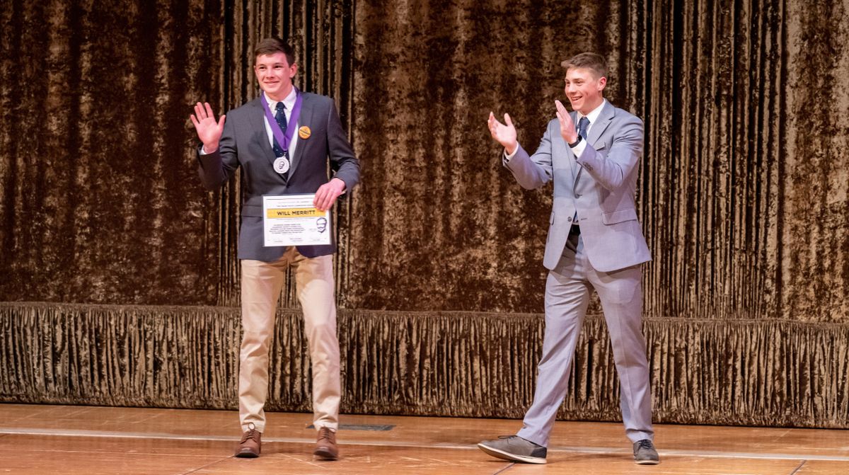 Will Merritt, a Lewis & Clark High School students waves to the crowd after receiving has Team Leadership award from Youth Commissioner Jack Schneider during the Chase Youth Awards ceremony, Thursday, April 14, 2022, at the Fox Theater.  (COLIN MULVANY/THE SPOKESMAN-REVI)
